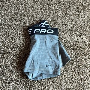 nike pros, size x-small